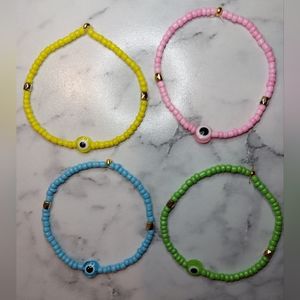 Evil eye bracelets made with seed beads and gold accents handmade by me 🧿🪬✨️